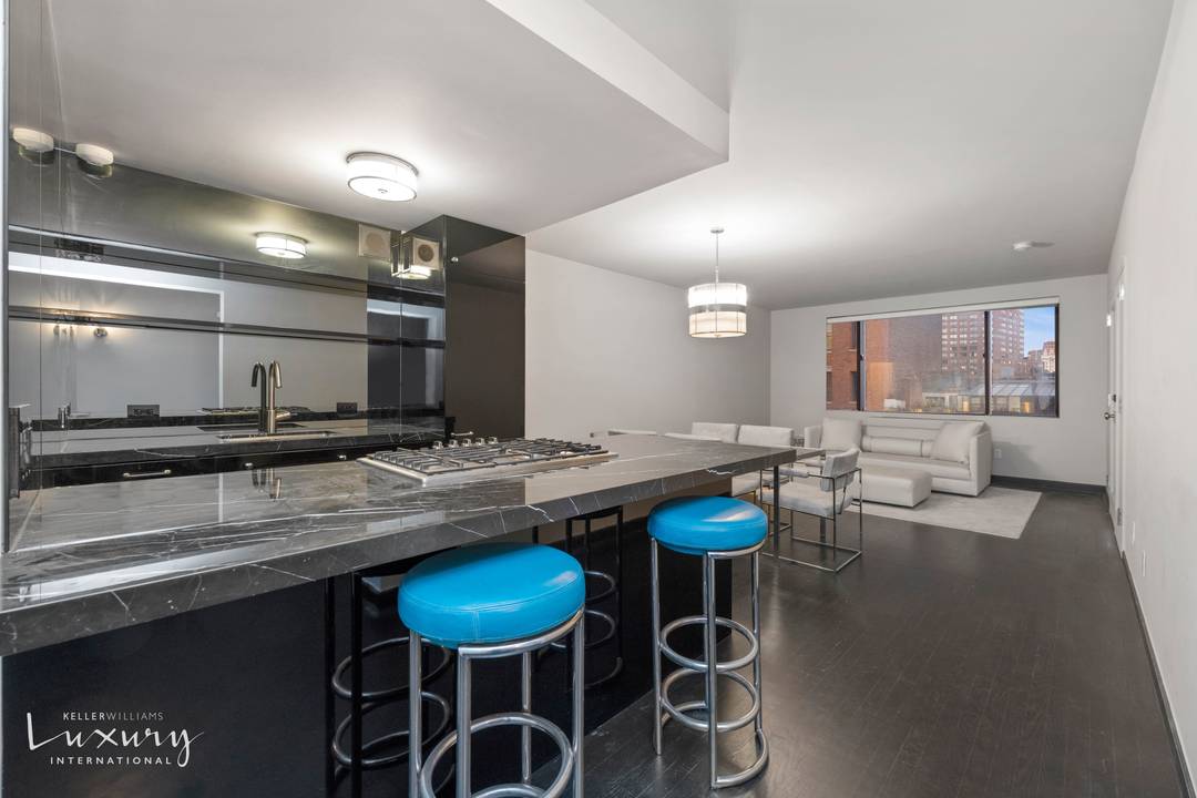 This spacious renovated one bedroom, one and one half bathroom apartment in the lovely Parc Village Condominium was decorated by renowned designer Ryan Korban.
