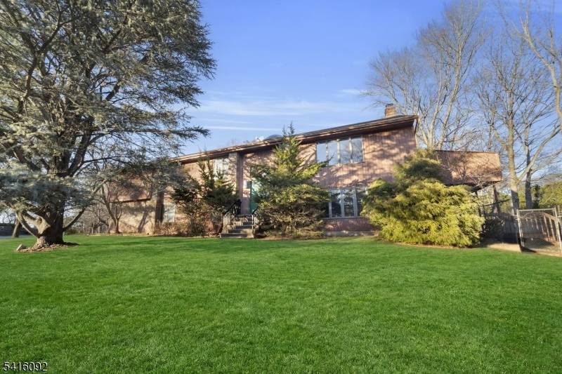 Welcome to this inviting home in the heart of Closter, New Jersey.