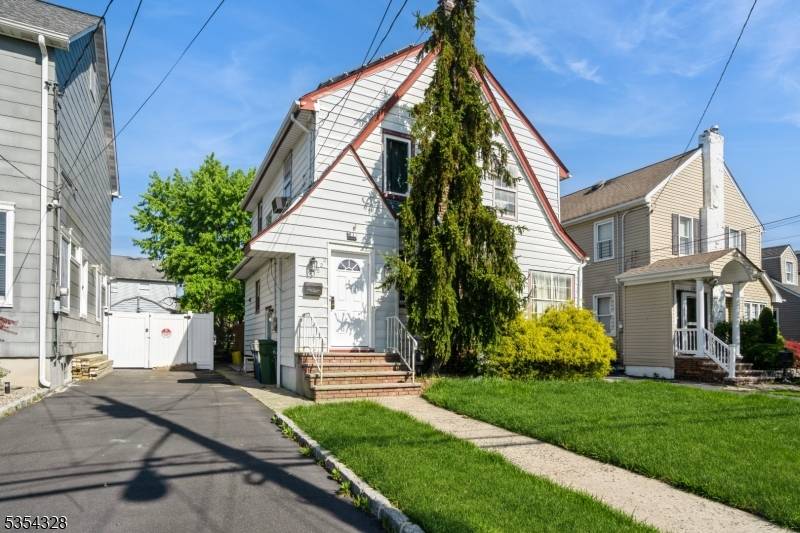 Welcome to this Colonial nestled in the sought after Sunnyside section of Linden.