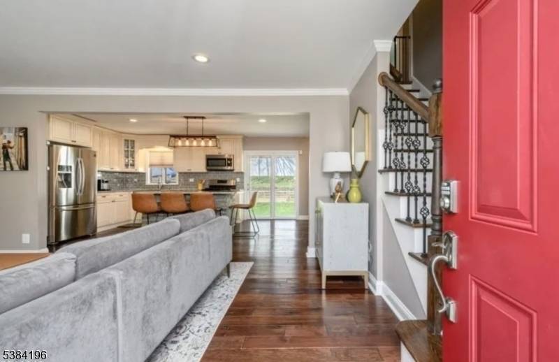TOTALLY RENOVATED EXPANDED CAPE THAT HAS IT ALL AND IS MOVE IN READY !