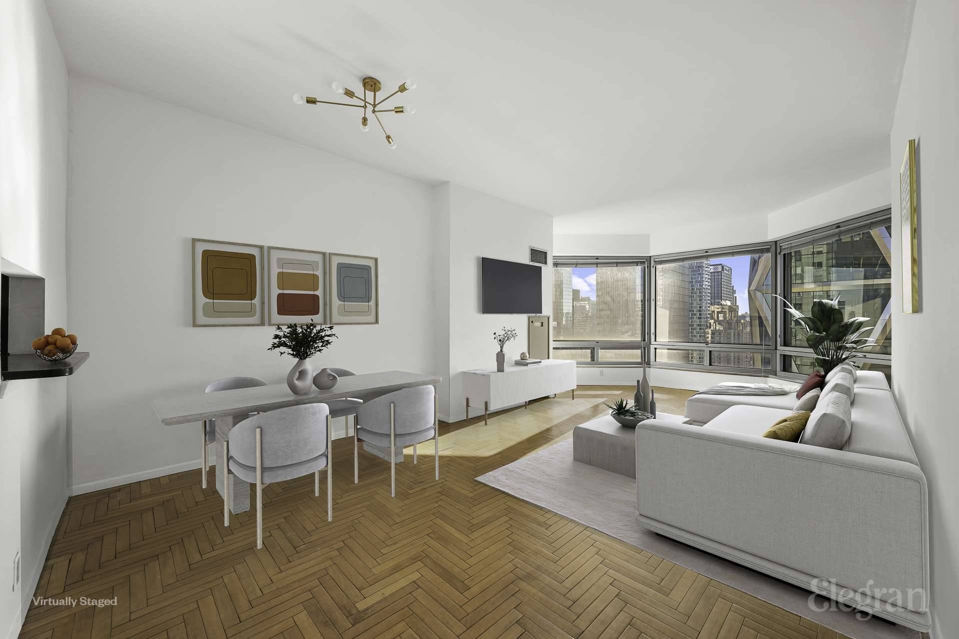 Perched on the 40th floor of Central Park Place, this sun drenched 1 bedroom 1.