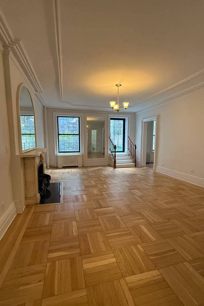 Sun Drenched Elegance with a Private Roof Terrace Perched on the third floor of a classic Upper East Side brownstone, this oversized residence blends old world charm with the rare ...