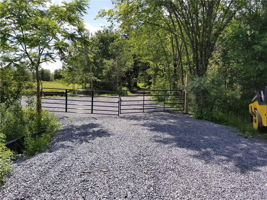 Unlock the potential of this expansive 25 acres of commercial land with 700 feet of road footage on Route 55, strategically located across from Wisseman and Cunningham Dr in a ...