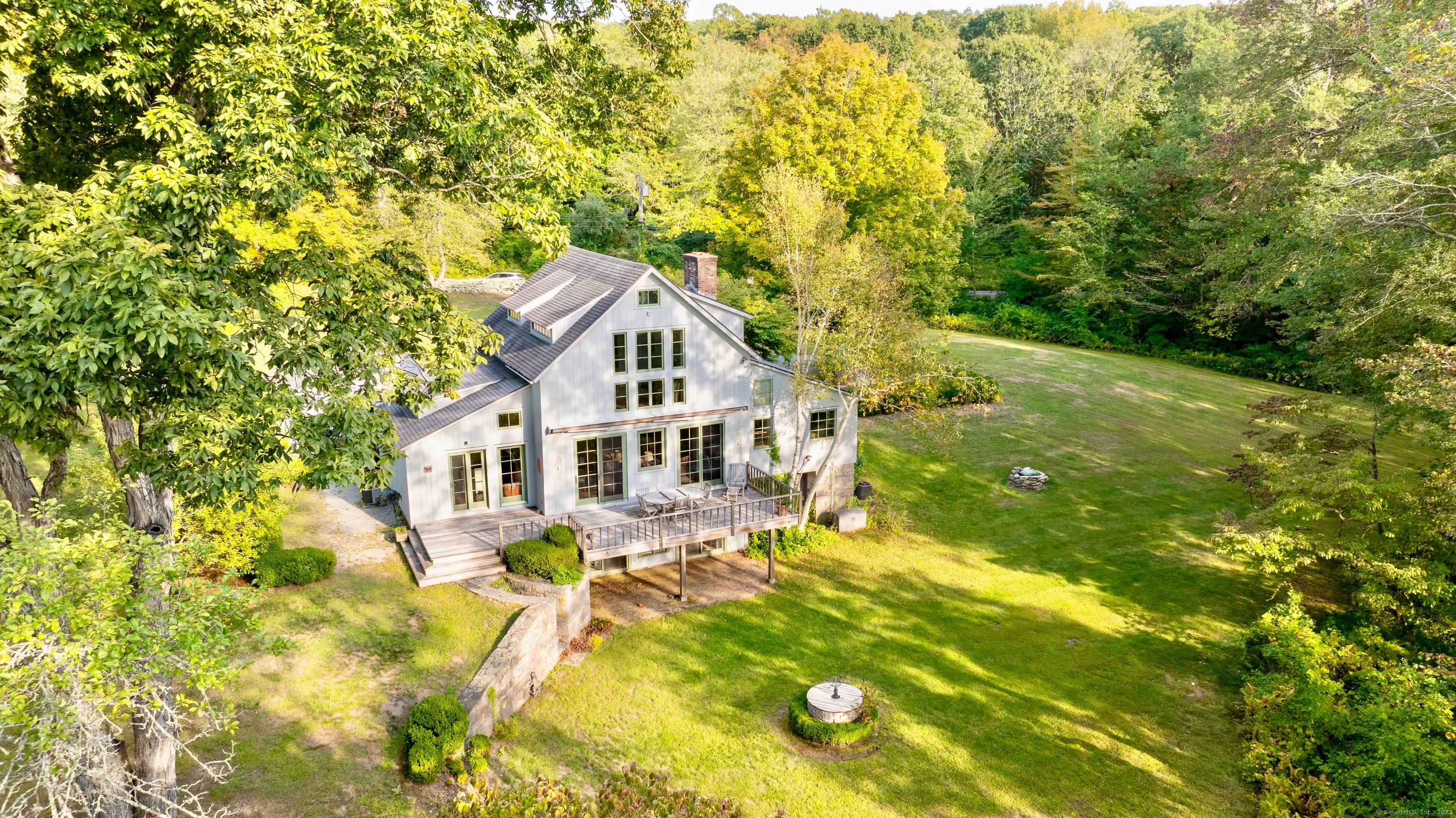 Situated on 5. 36 quiet, country acres, this one of a kind converted barn makes a wonderful year round home or weekend getaway !