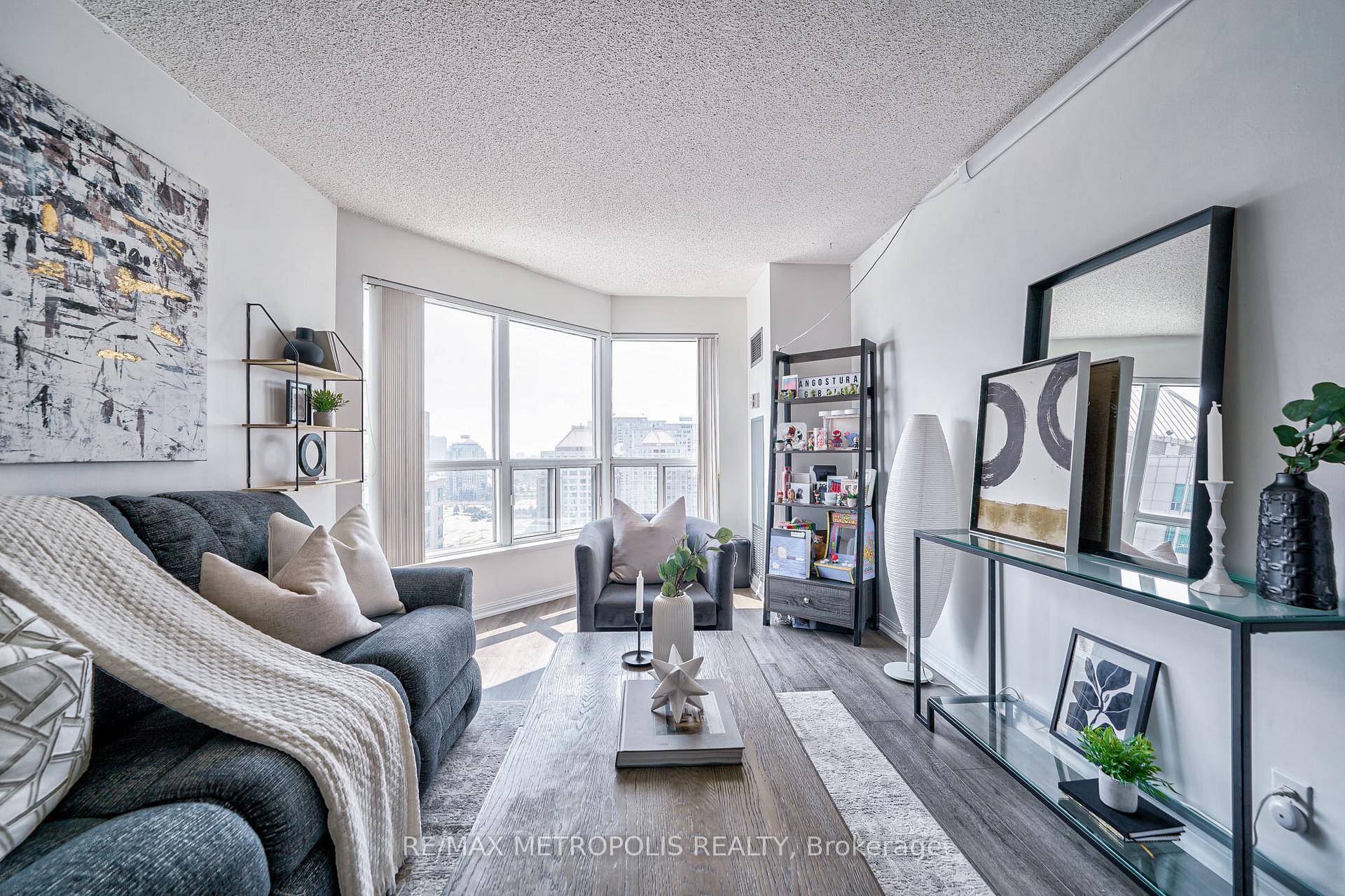 Welcome to this stunning penthouse suite where modern luxury meets convenience.
