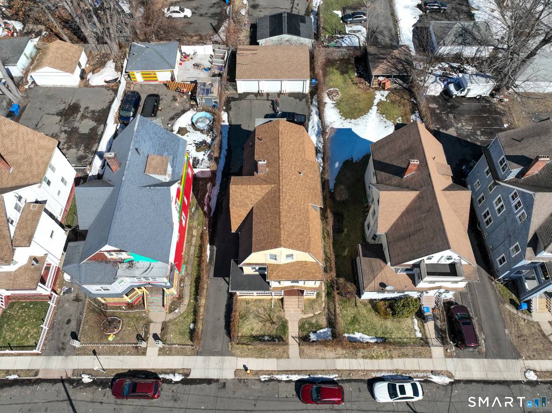 Owner occupant or investment opportunity in this spacious three family property.