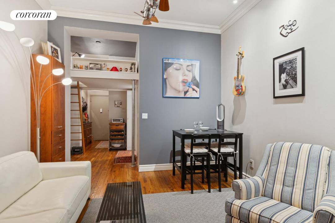 LOFT LIKE STUDIO with HIGH CEILINGS at 11' and OVERSIZED WINDOWS and EXPOSED BRICK adding Charm to the Entire Apartment.