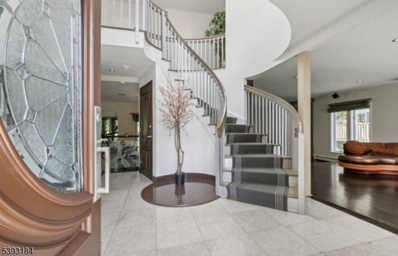 Located in one of the most private and quiet residential areas of Englewood Cliffs, this spacious home features 5 large bedrooms and 5.