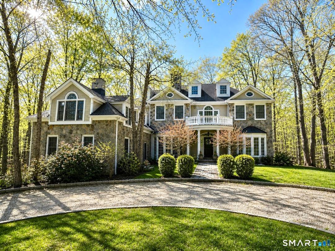 Beautifully rebuilt in 2006, this custom turn key retreat offers 4 spacious Bedrooms with the flexibility for a 5th, 3 full 2 half baths, all set on 2.