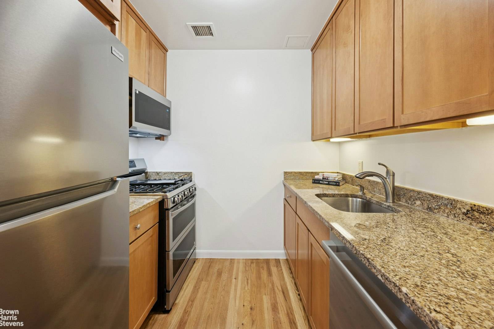 Two bedroom penthouse with a private two story roof deck in a Central Harlem condo.