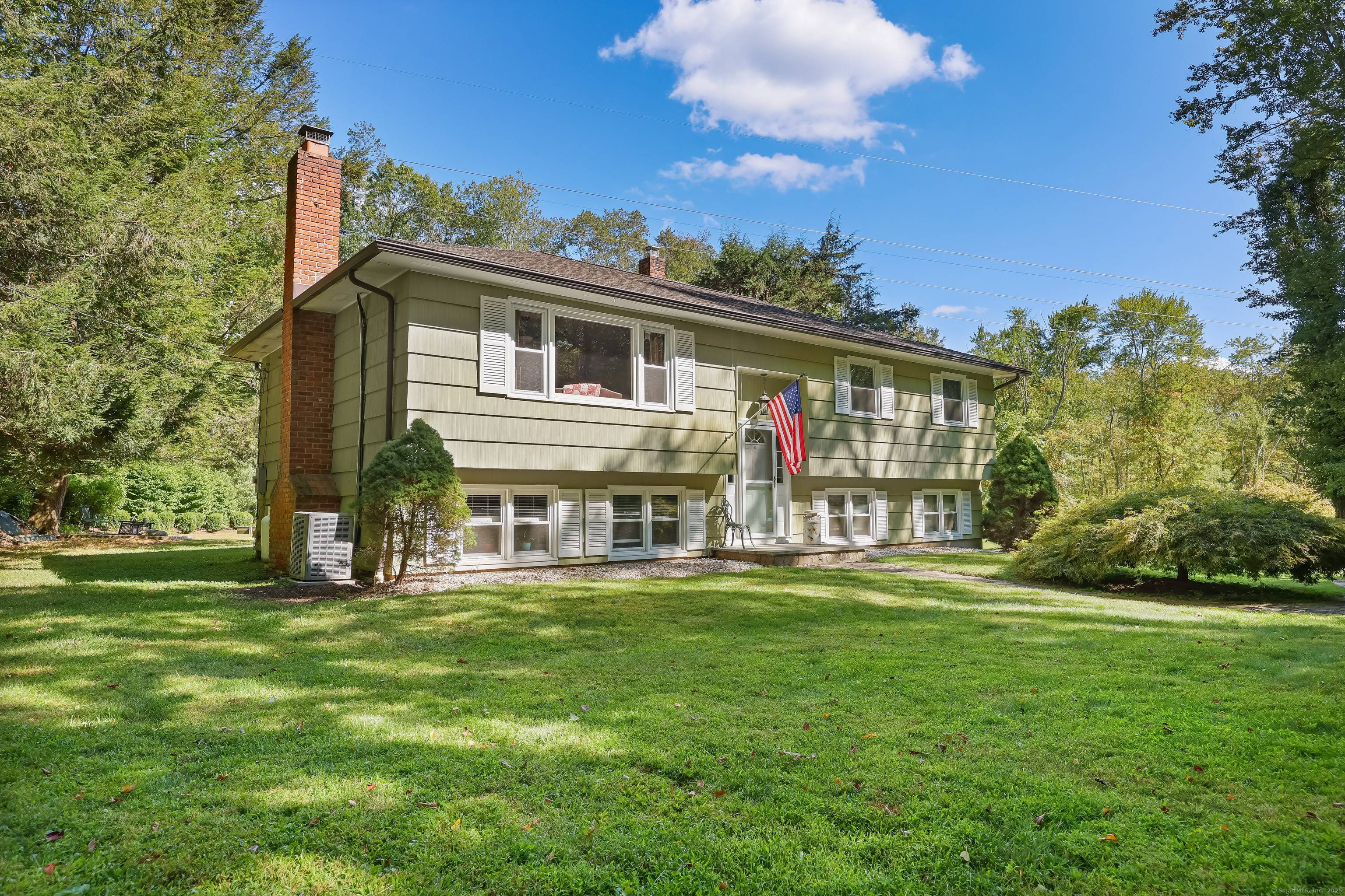 Welcome to this beautifully maintained raised ranch on 2.