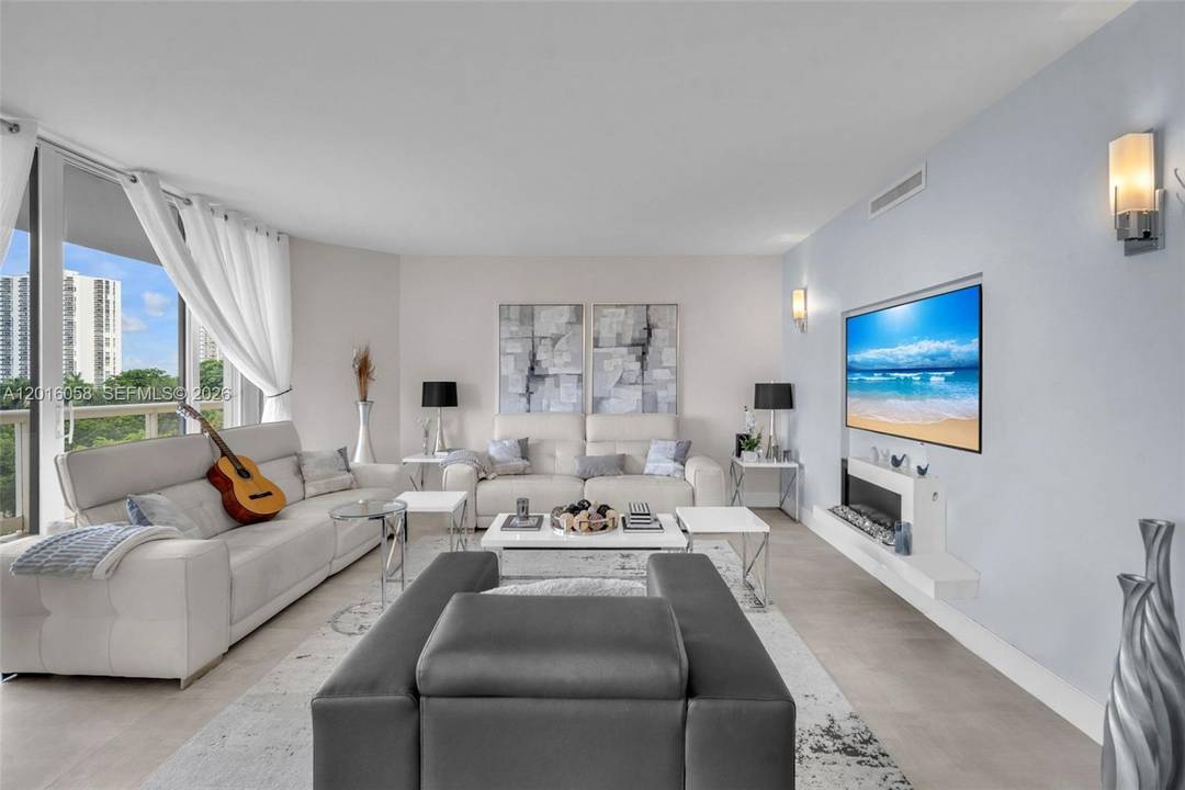 Live the luxury Aventura lifestyle in this stunning fully furnished turnkey residence with breathtaking golf, lake, and water views.