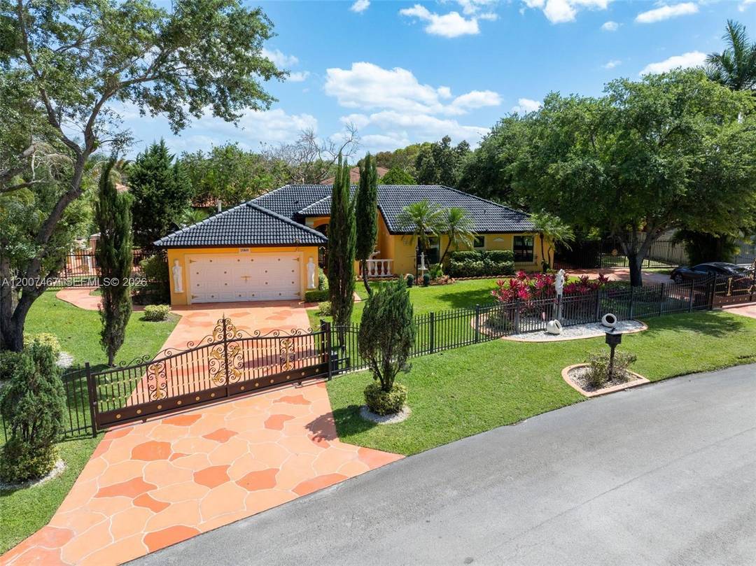 Welcome to 15860 SW 287 St, a spacious 4 bedroom, 2 bathroom home situated on an expansive 20, 000 sq ft lot, offering privacy, comfort, and beautifully maintained surroundings.