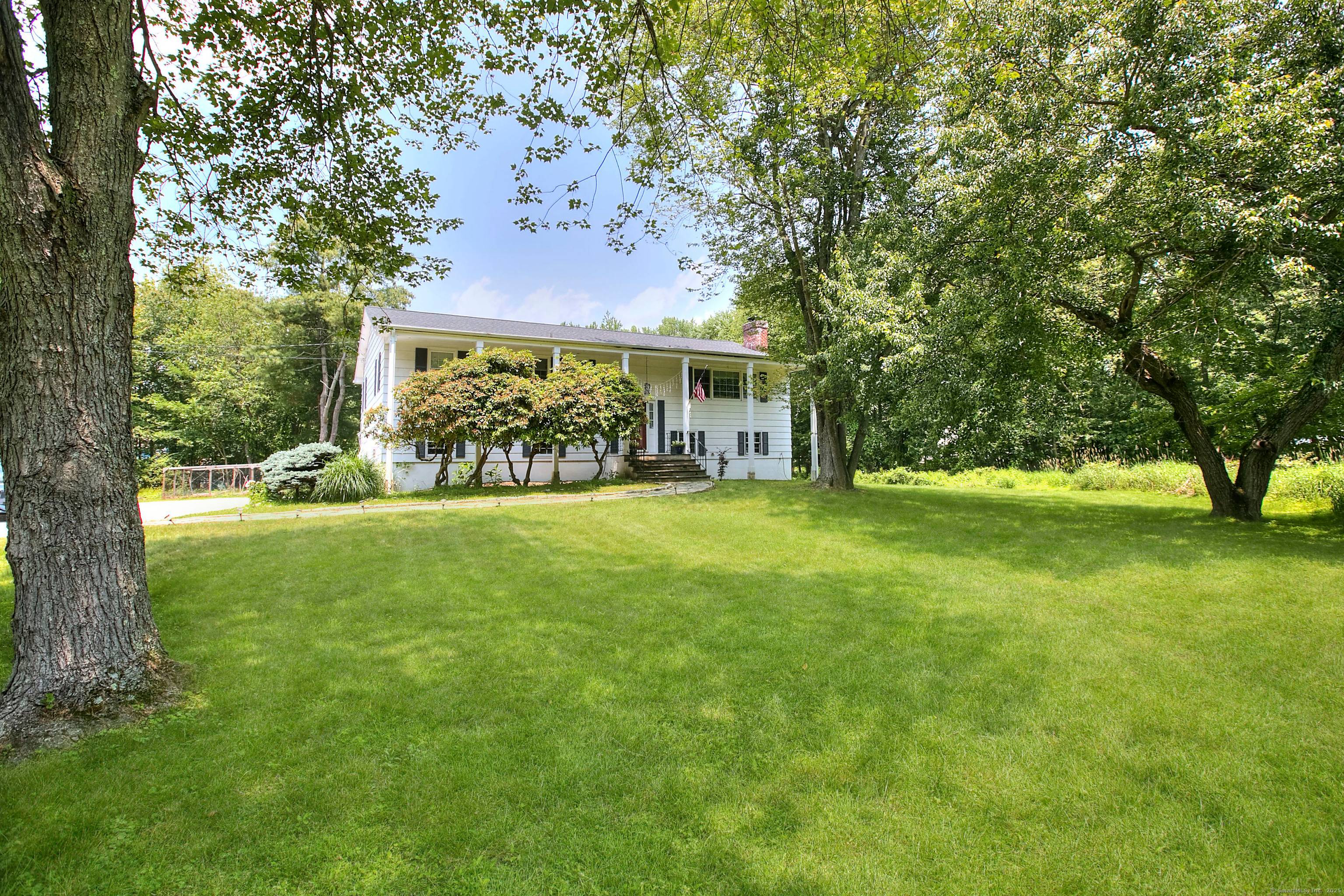 This light filled home is set on 2 acres finished on both levels with over 2300 sq ft of living space.