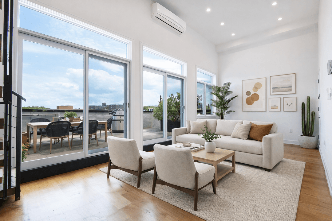 This penthouse 2 bedroom home looks over two large terraces at the front and rear of the building.