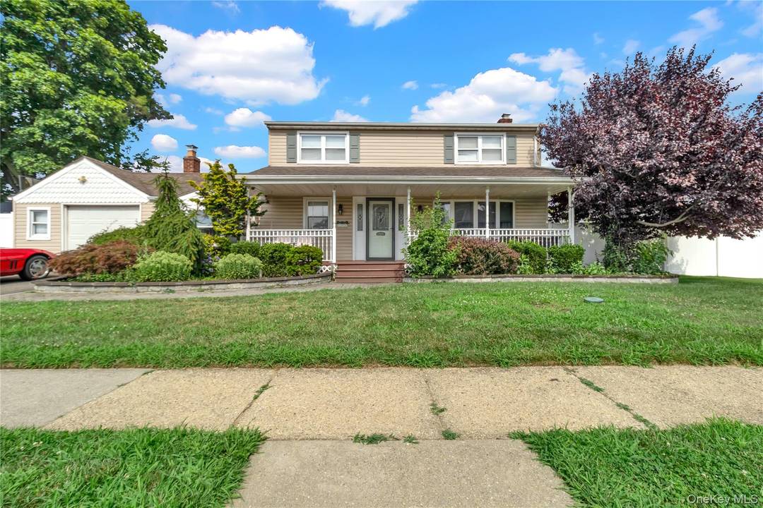 Gorgeous colonial with classic Front Porch, Eik with granite countertops and S T appliances, Sunken Den with Wood Fireplace, Formal Dining and Living room, Spacious Bedrooms, Wood Floors, IGS, So ...
