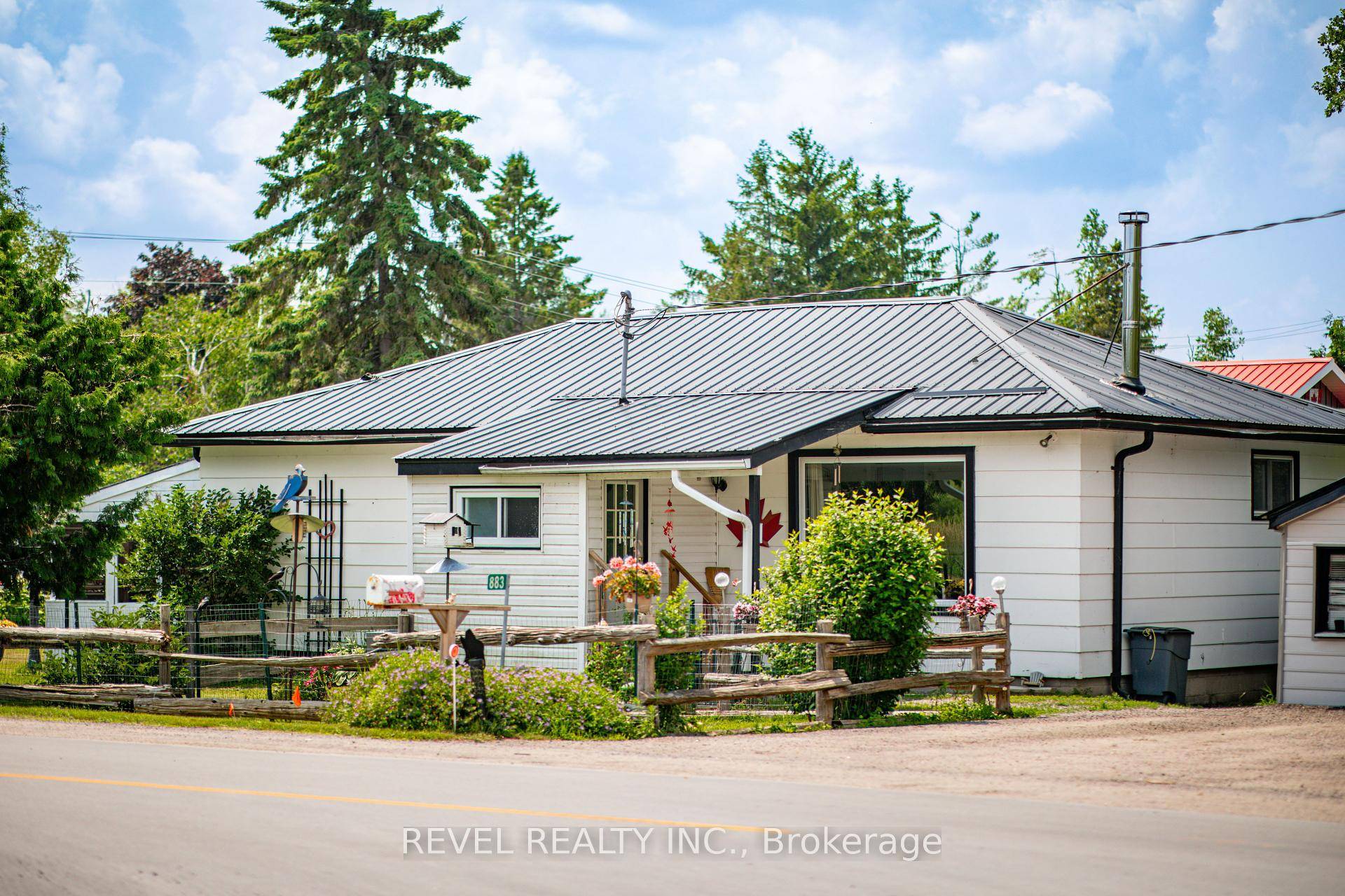 Dreaming Of A Cozy Year Round Bungalow Just Steps From The Water Without The Waterfront Price Tag ?
