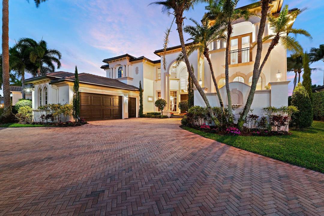 Experience the premier Frenchman's Reserve lifestyle in this coveted Villa Rosa estate, situated just a block away from the Club in the heart of Palm Beach Gardens.