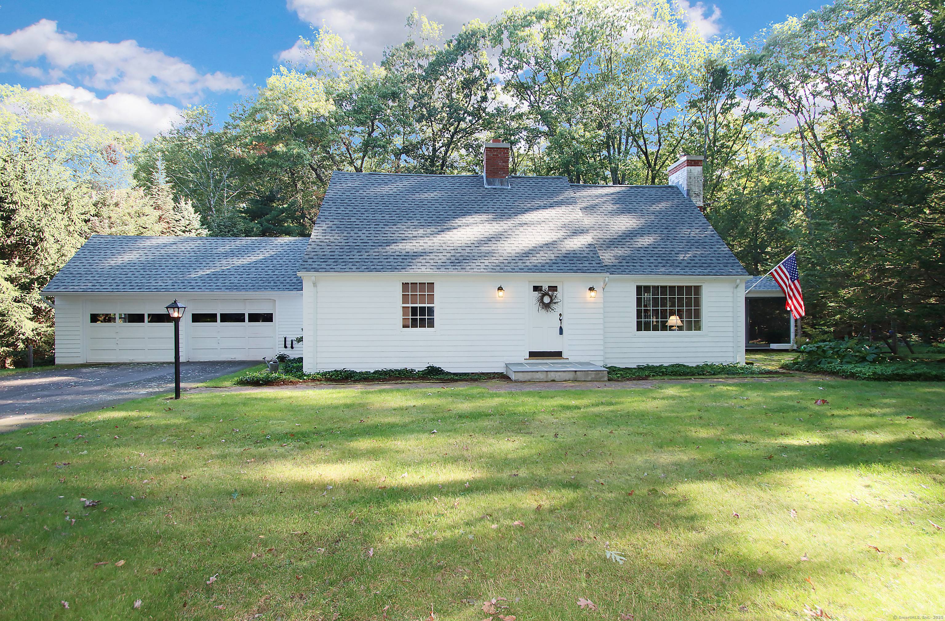 Very peaceful setting is offered with this New England charmer !
