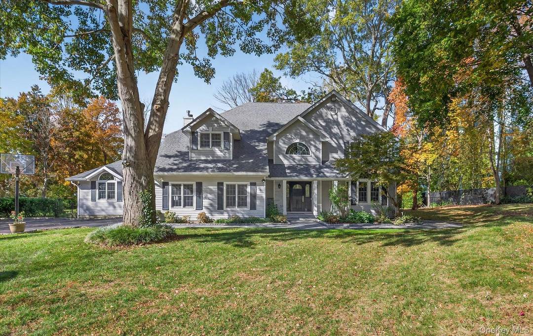 Welcome to 375 Vanderbilt an Exquisite Colonial in a One of a Kind Private Setting.