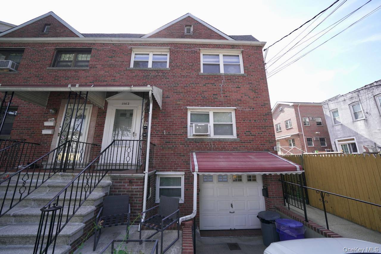 Welcome to this beautifully maintained brick 2 family home in the heart of Morris Park !