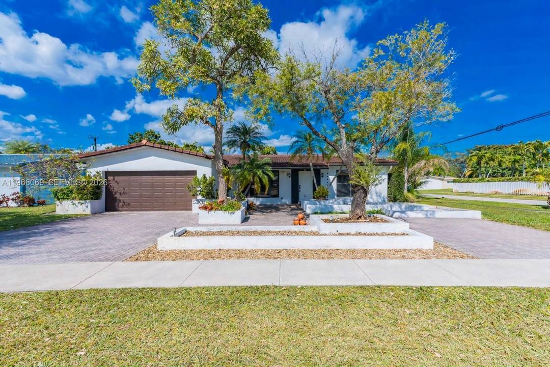 RARE CORNER LOT ! ! Beautiful 3 bedroom, 2 bath home situated on an OVERSIZED, fully fenced in corner lot with a heated pool in a prime location.