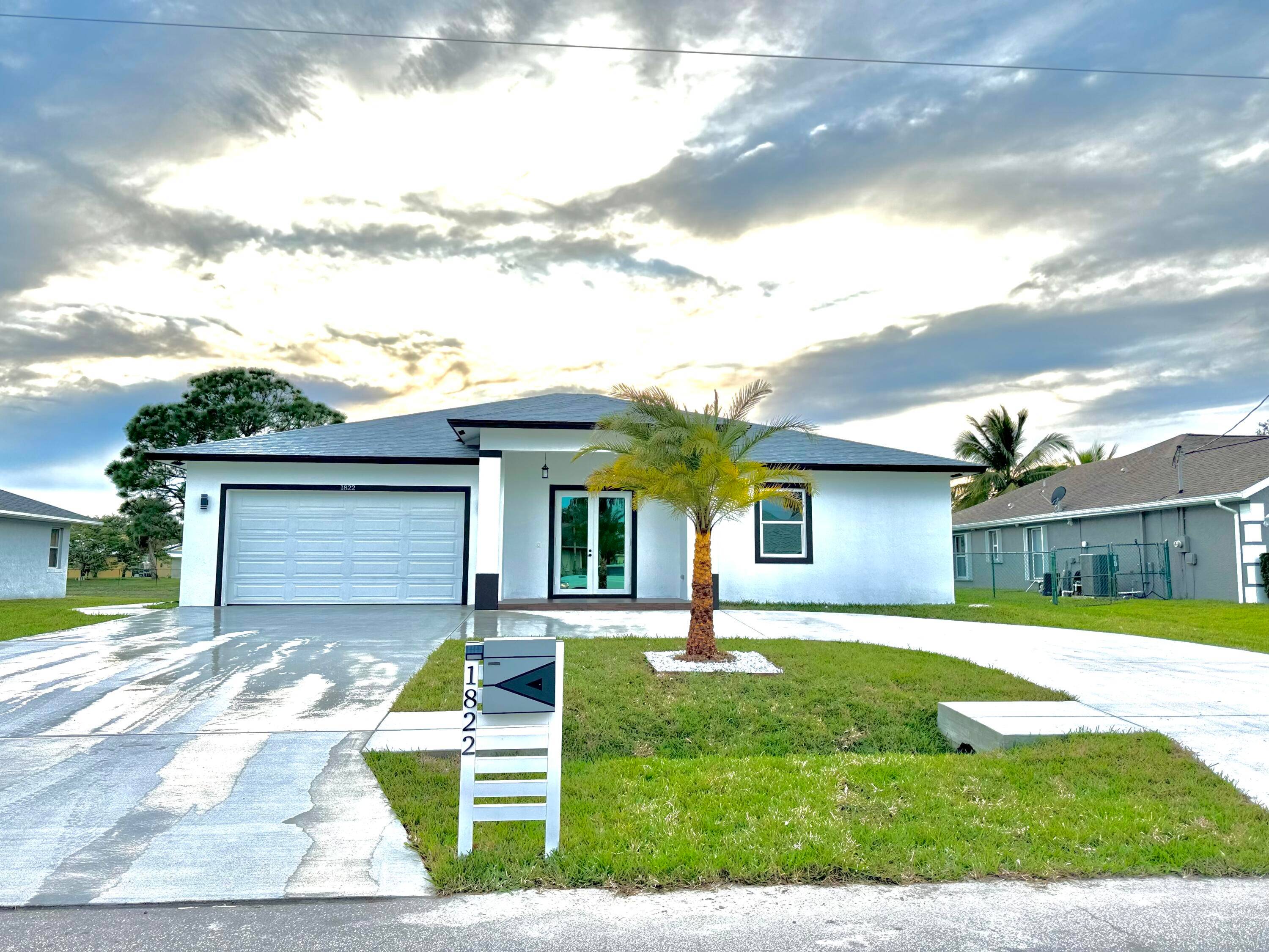 Great Opportunity In Port St Lucie, Newly Built Beautifully Designed 4 Bedroom, 3 Bathroom Home With Lots of Space, Volume Ceilings, Large Kitchen.