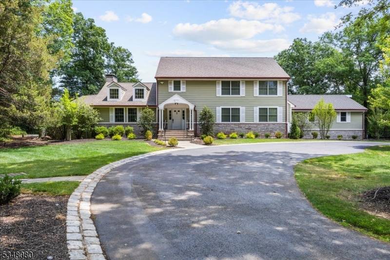Set on a breathtaking lot spanning 5 acres, this custom renovated Colonial offers over 4, 500 square feet of refined living space.