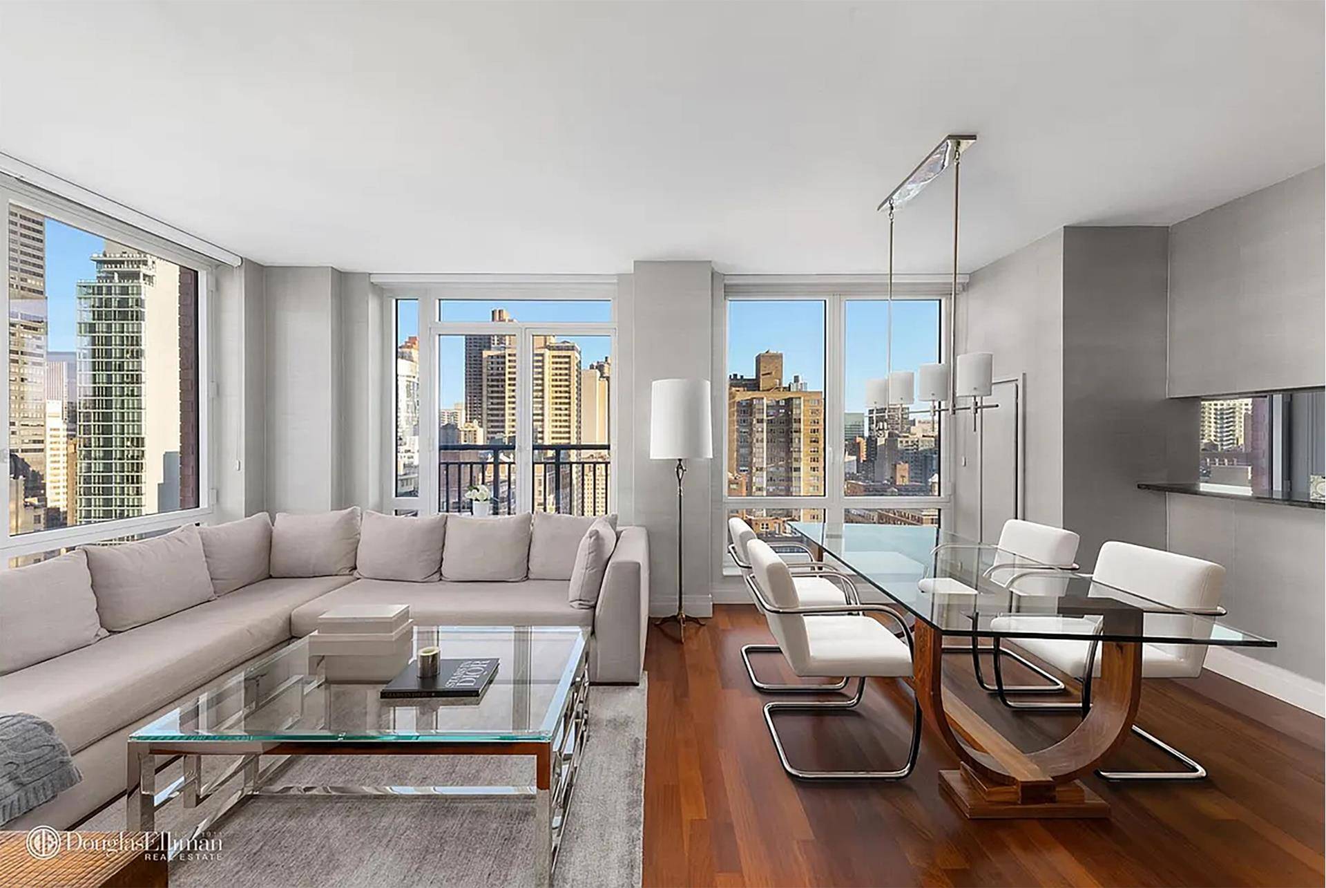 Beautifully designer furnished 913sf turn key sunny corner 18th floor 1 bedroom with a powder room, Juliet balconies and direct views of the Chrysler building, and wide open city views ...