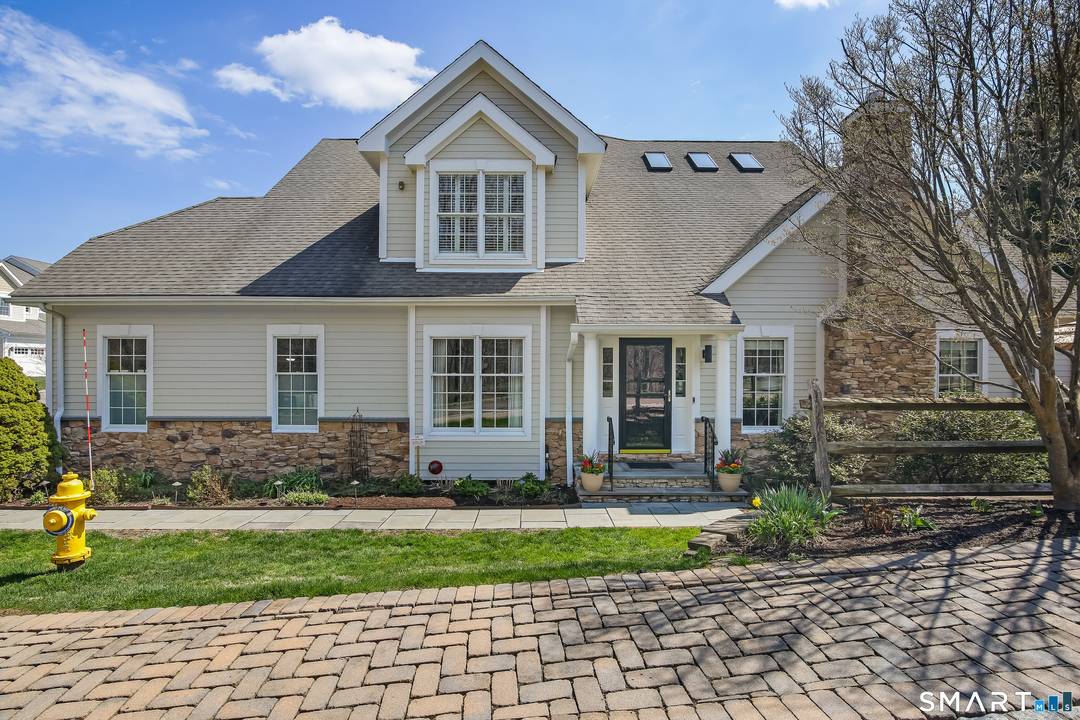 Experience the pinnacle of over 55 living in this meticulously updated Grand View end unit.