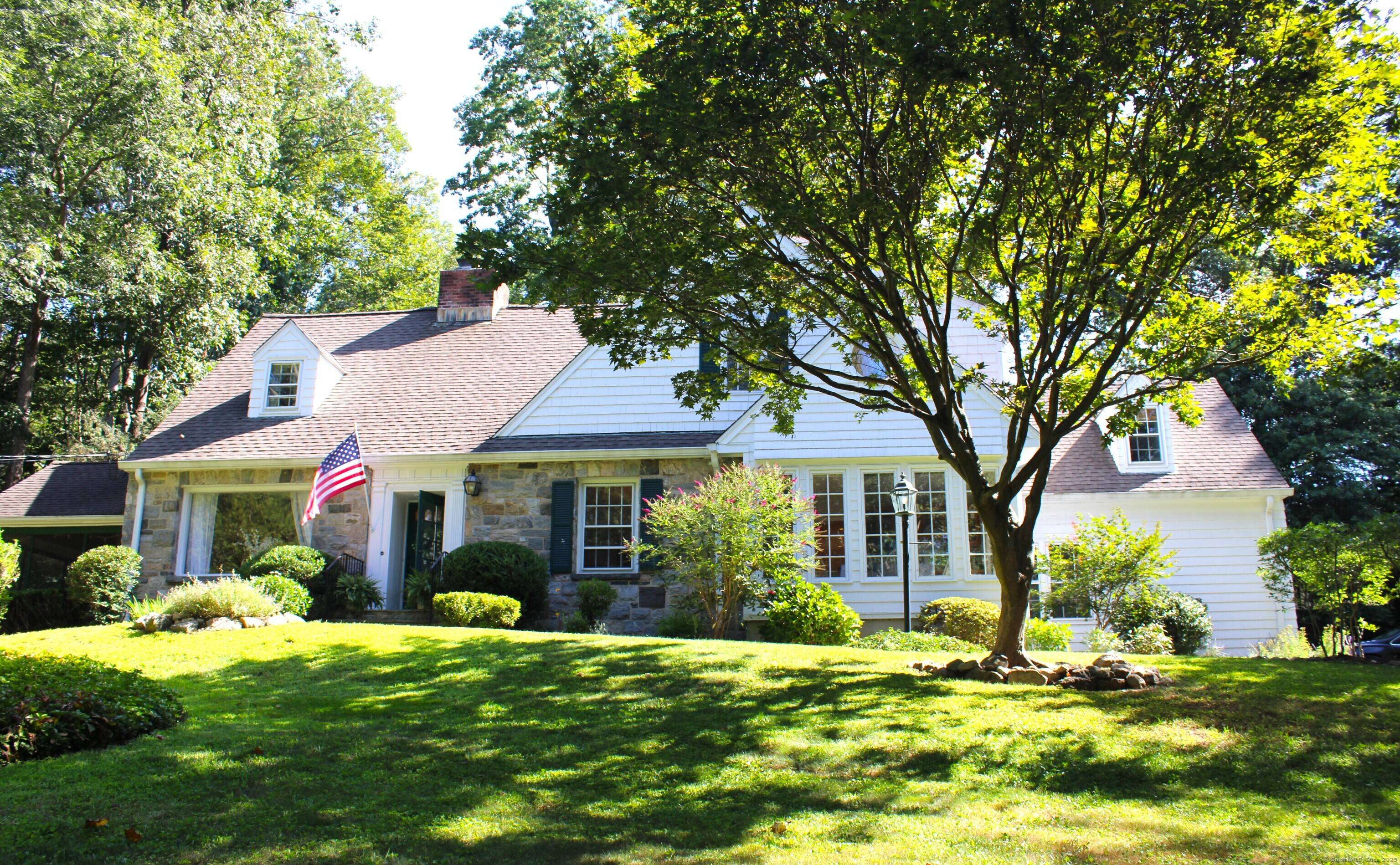 Meticulously maintained with a property steeped in history, this stone front beauty has all the charm of an English Country cottage, sits on 1.