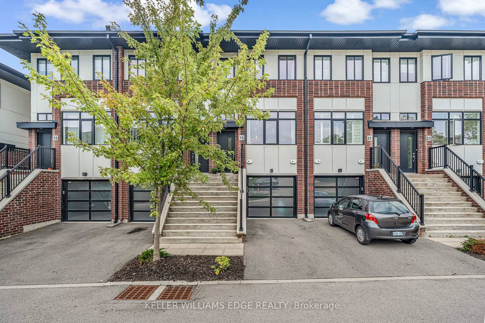Step into this modern 3 storey, 2 1 bedroom townhouse, just steps from all amenities, shopping, and easy highway access.
