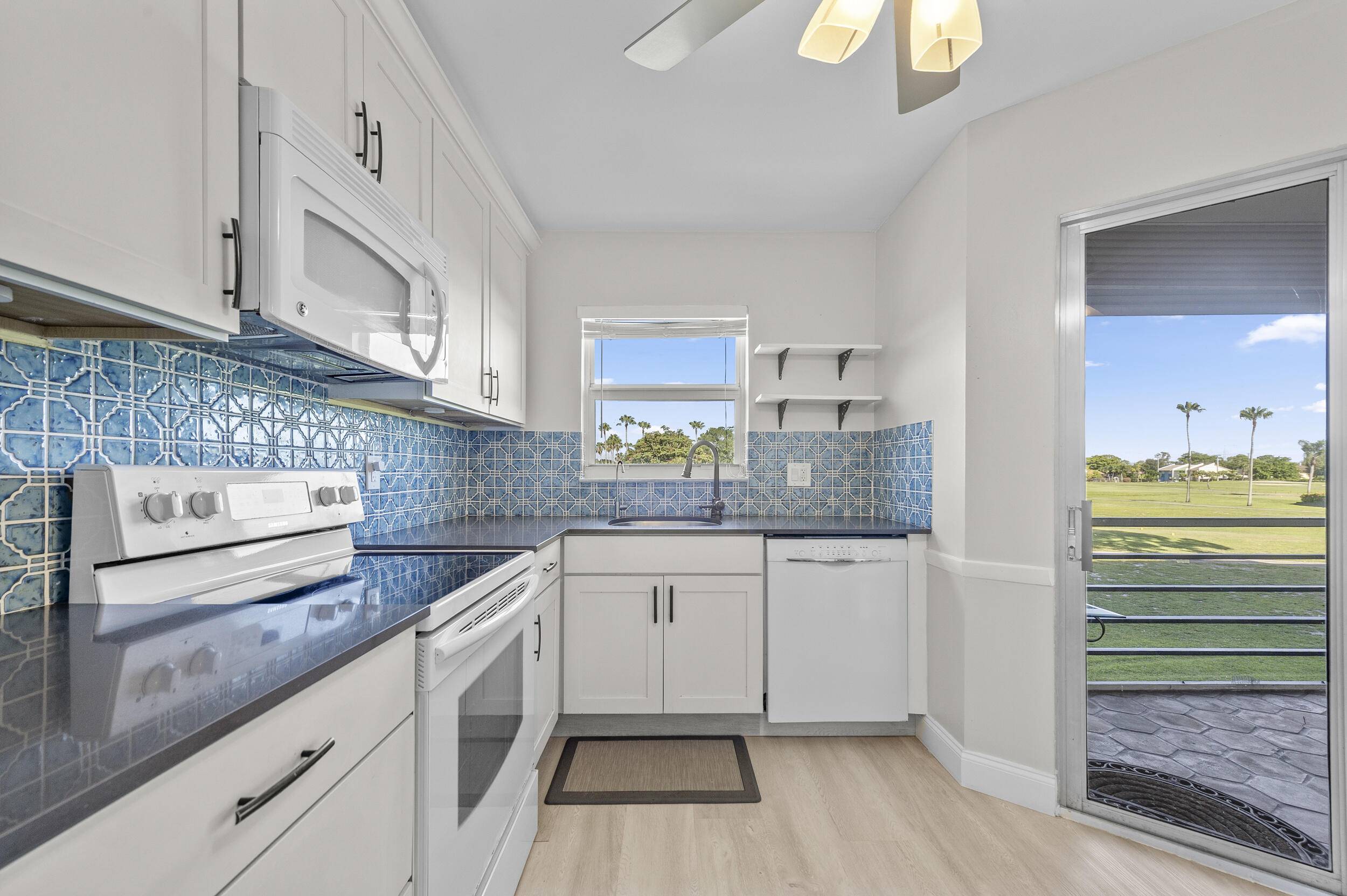 Welcome to this beautifully upgraded true corner unit in the highly sought after 55 community of Poinciana Place in Lake Worth !