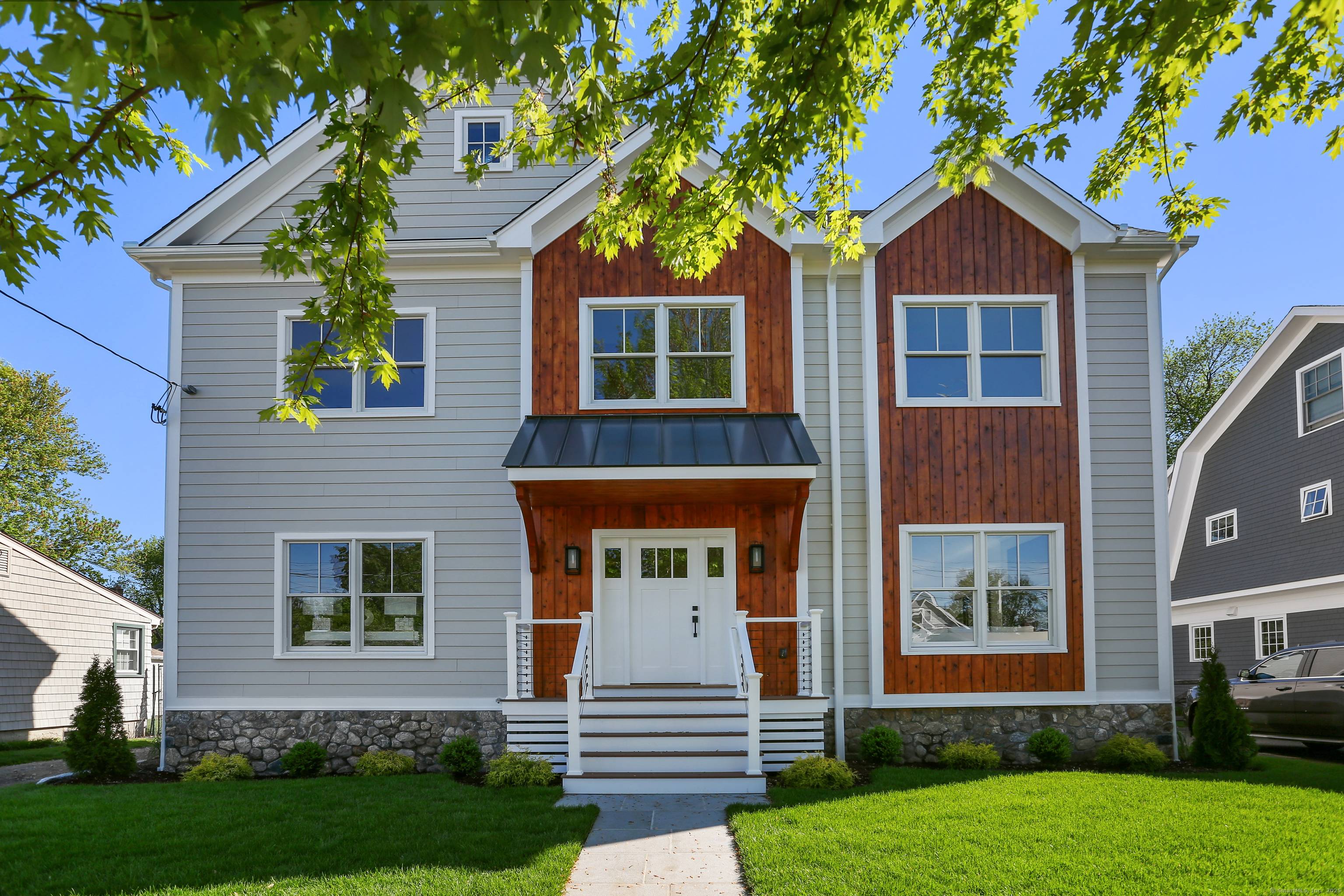 Stunning NEW construction nestled in the desirable Fairfield Beach neighborhood.