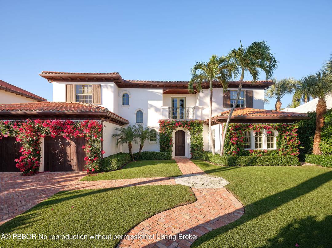 Beautifully reimagined and thoughtfully designed, this exceptional residence is perfectly positioned on one of the premier lake blocks in West Palm Beach's coveted SoSo neighborhood.