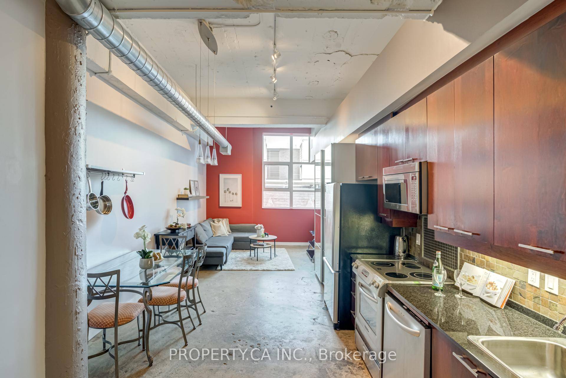 This stunning fully furnished 1 bedroom loft in the historic Merchandise Lofts offers the perfect blend of space, comfort, and authentic urban living.