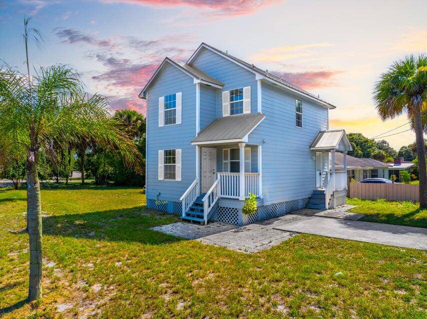 Discover this beautifully renovated two story home, perfectly situated on a spacious corner lot in the vibrant heart of Fort Pierce.