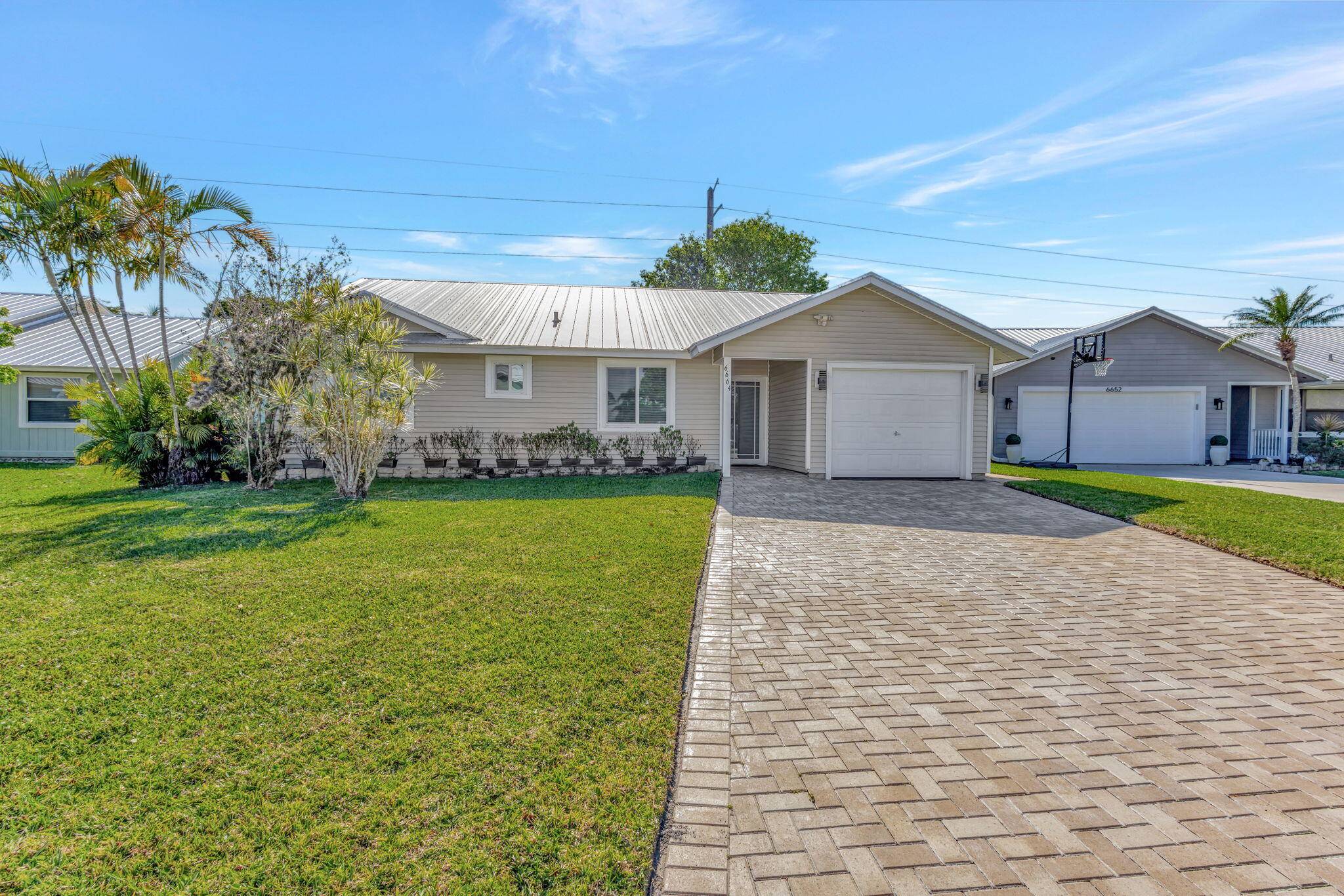 Step into this stunningly upgraded top to bottom 3 bed, 2 bath home that combines modern style with luxurious finishes.