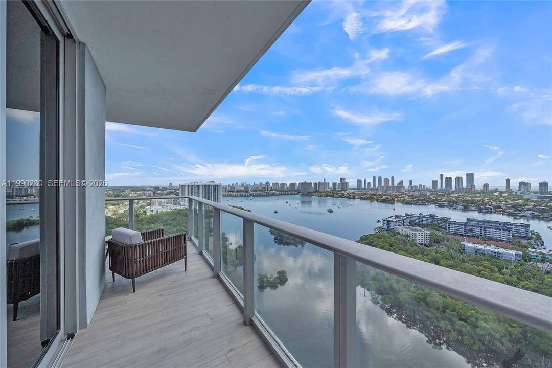 Modern and bright 3 bedroom, 3 bathroom residence at The Harbour, offering spacious interiors with expansive open views of the water and skyline from a high floor.
