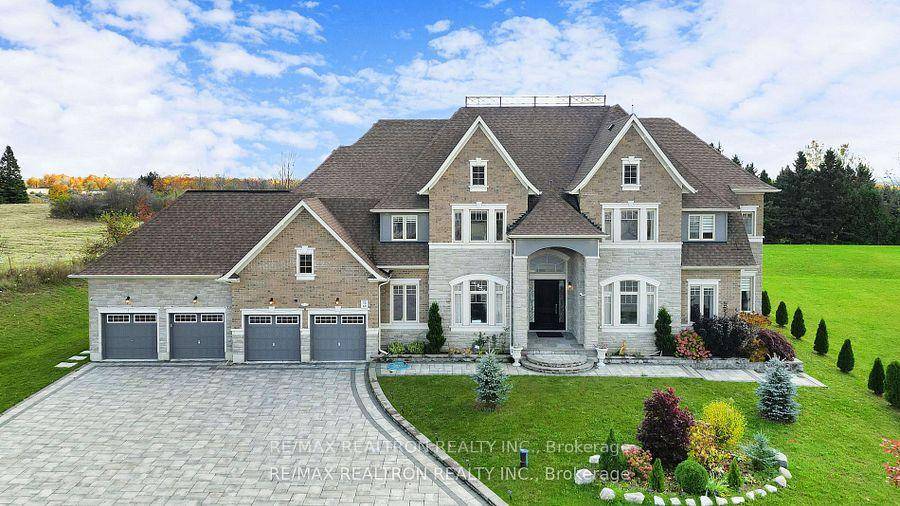 Experience ultra luxury living in this breathtaking showstopper set on a premium 1 acrepie shaped lot in an exclusive estate court !