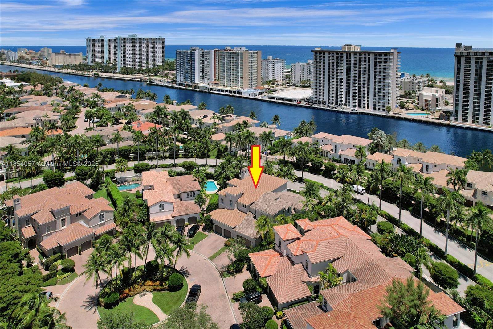 Located on a quiet tree lined street in the prestigious gated community of Harbor Islands, one of a kind spectacular 2 story home is upgraded with everything you would expect.