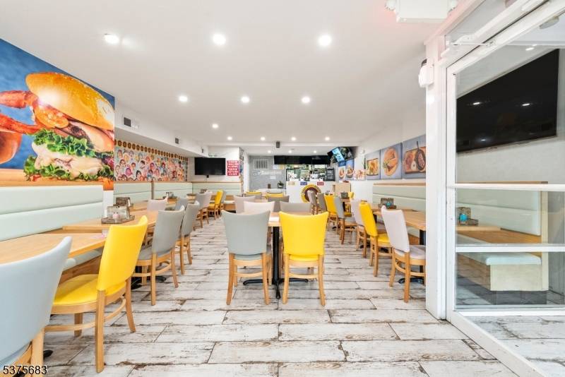 Seize this rare opportunity to own a fully operational, income generating mixed use property in the heart of vibrant Elizabeth Ave, one of Elizabeth, NJ's most desirable and bustling locations.