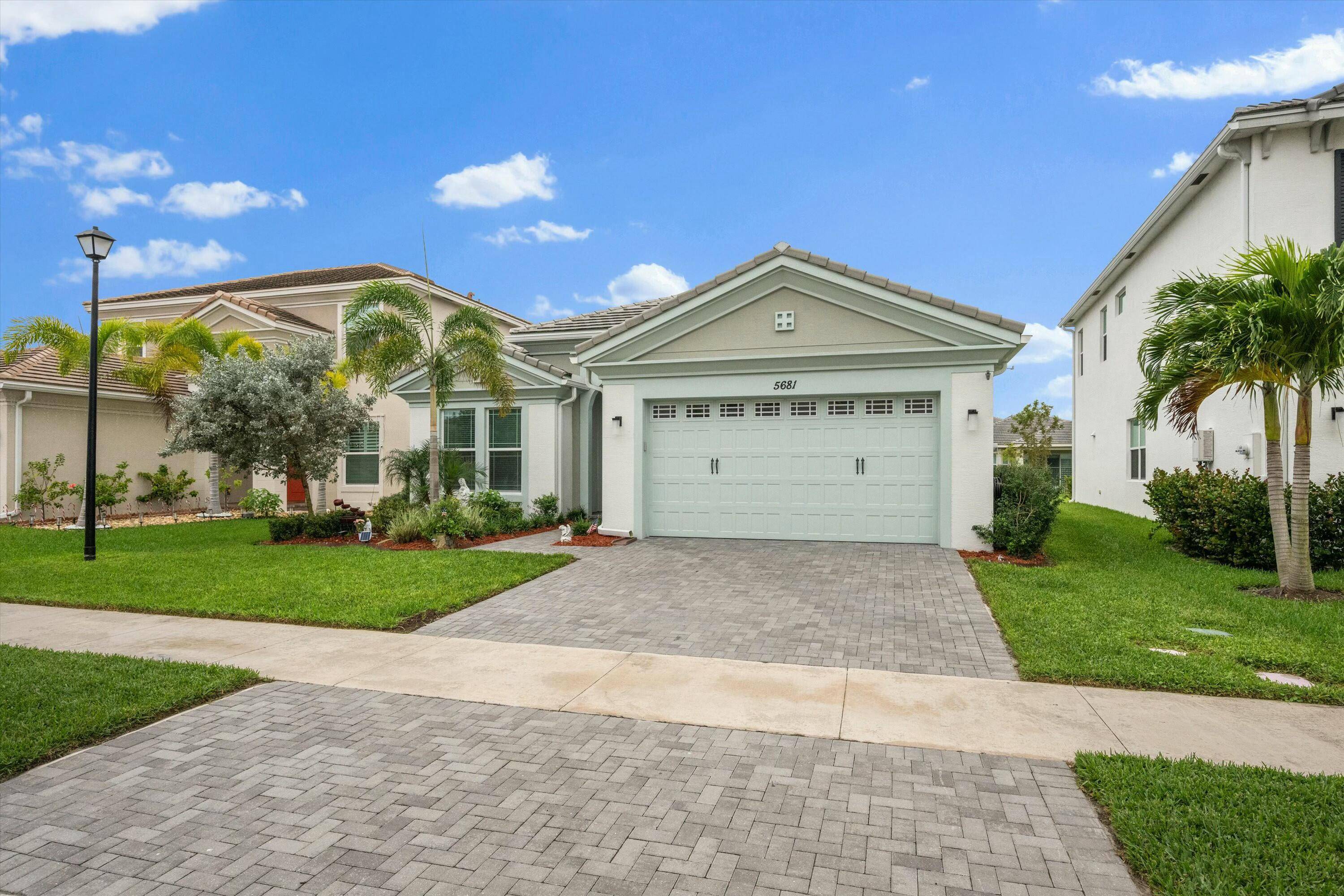 Welcome to the highly sought after Orchards Community, where this exquisite Persimmon model awaits you.