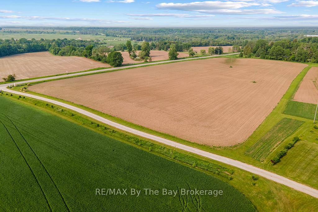 33 acres, minutes from Creemore w 30 workable acres, highly valued sandy loam.