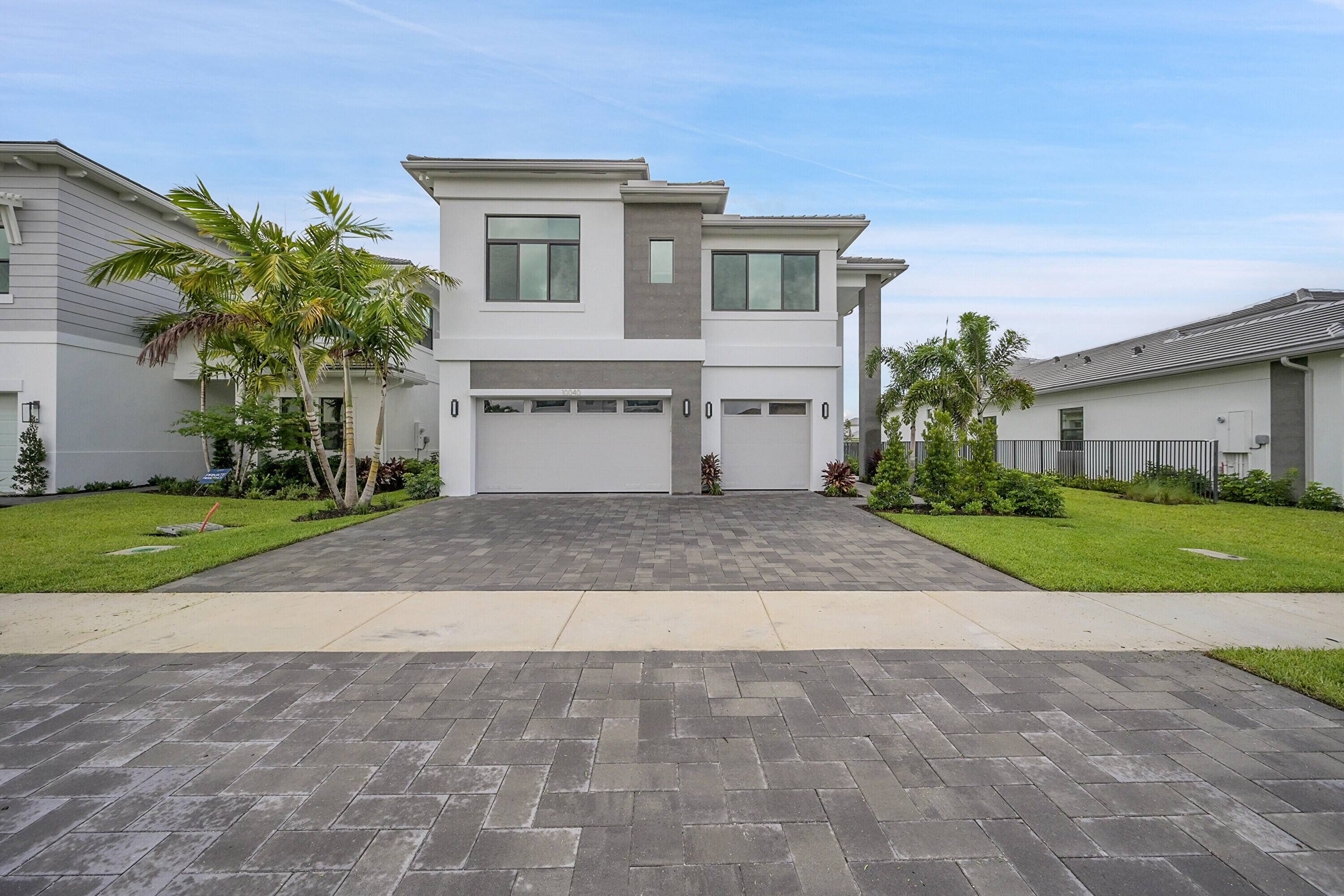 5 spacious bedrooms, 5 bathrooms, 3 car garages with a pool, and waterfront a spacious loft, a beautiful balcony on the 2nd floor.