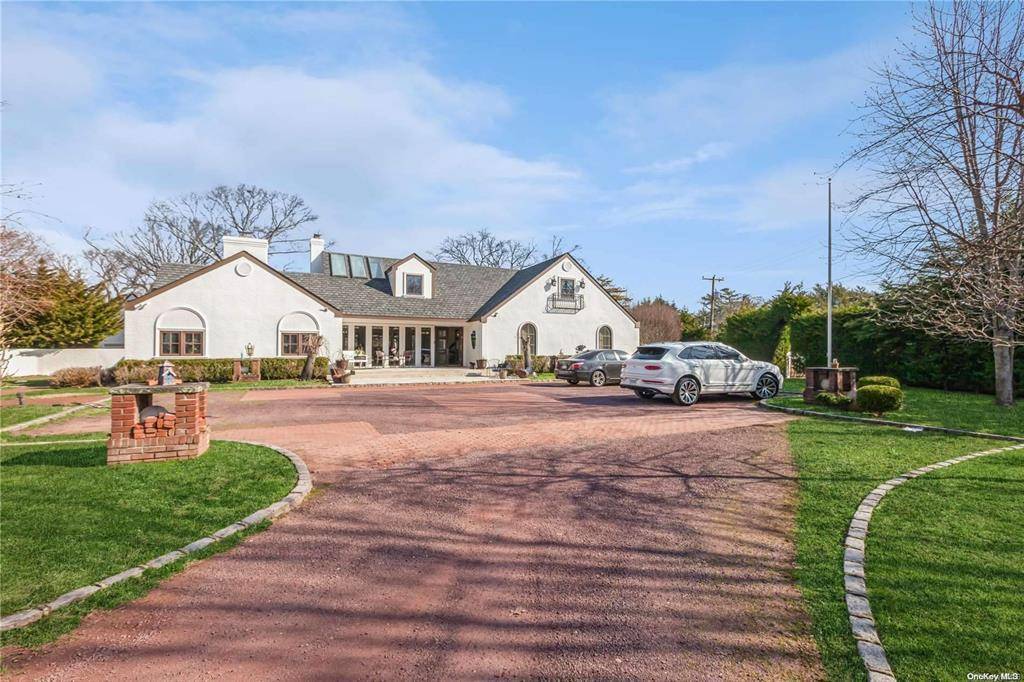 Nestled within the serene confines of the esteemed Back Lawrence neighborhood, this secluded haven boasts unparalleled privacy and opulence.