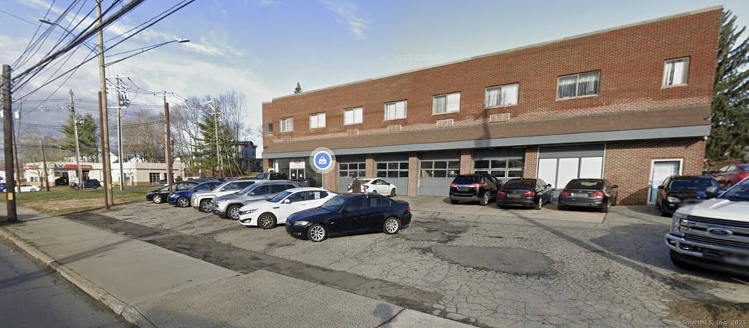 Retail building near city center with many permitted uses.