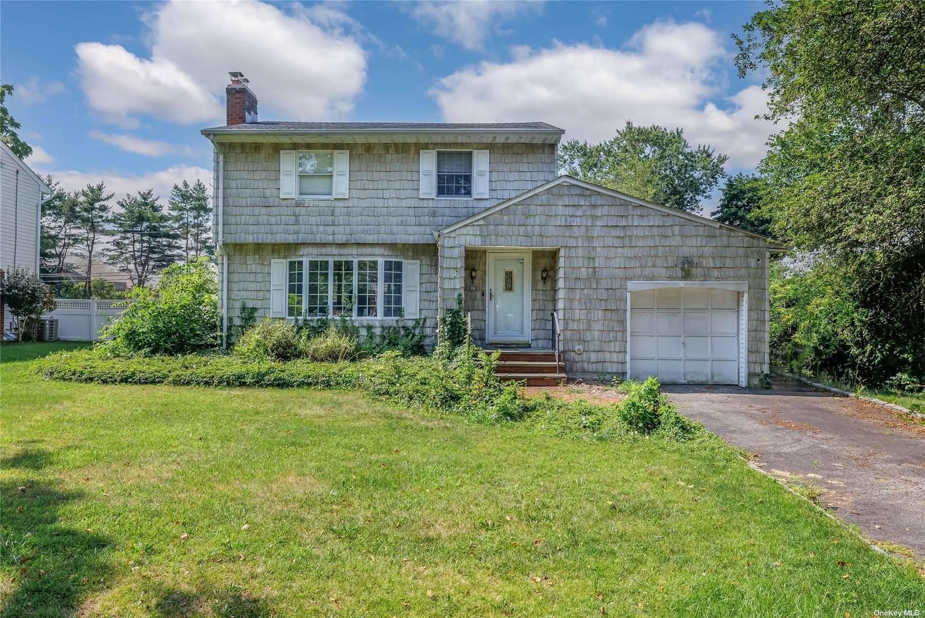 Oversized Colonial Located In Country Village Neighborhood With Half Hollow Schools.