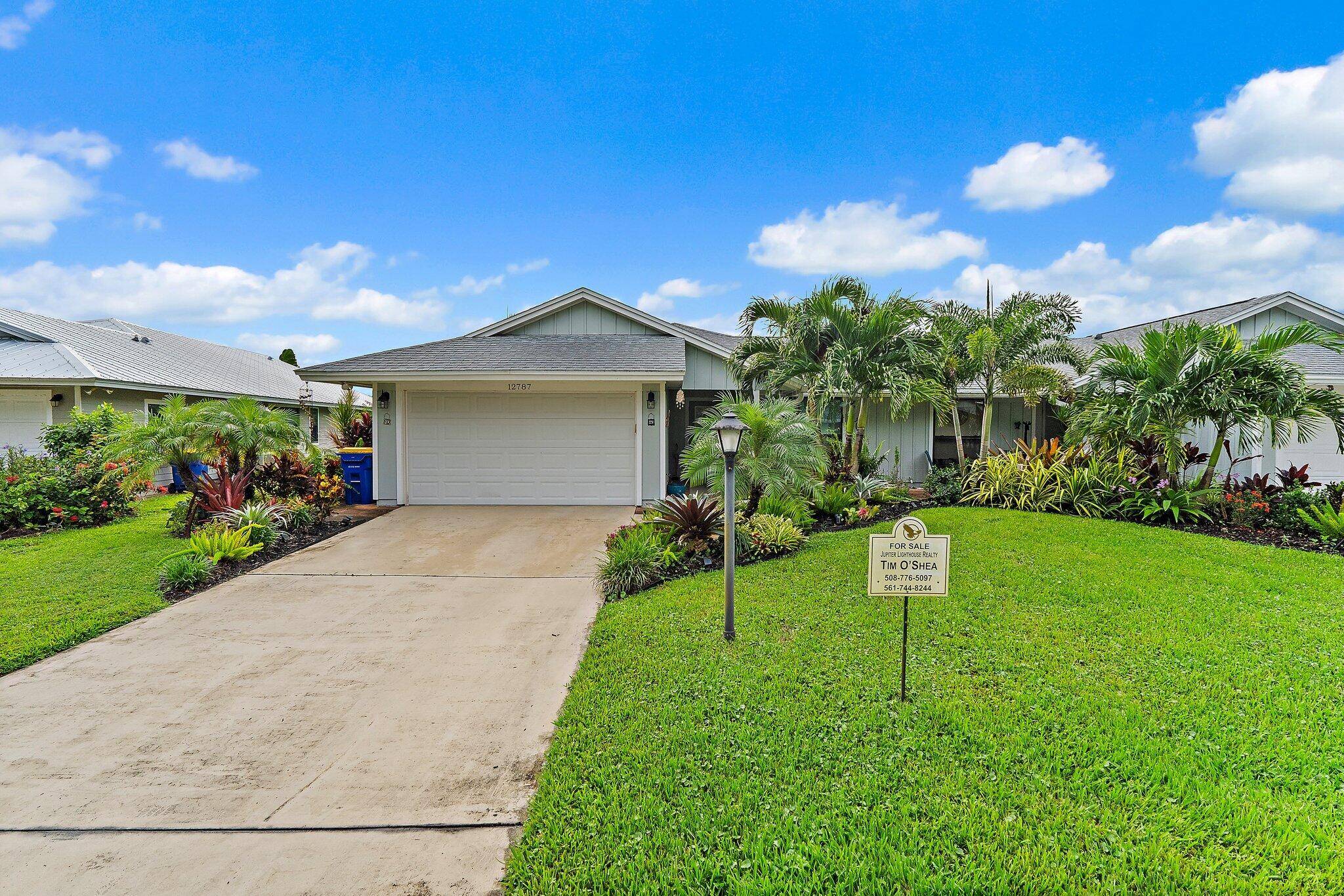 This charming home sits pretty on an oversized lot with stunning views of the executive golf course.