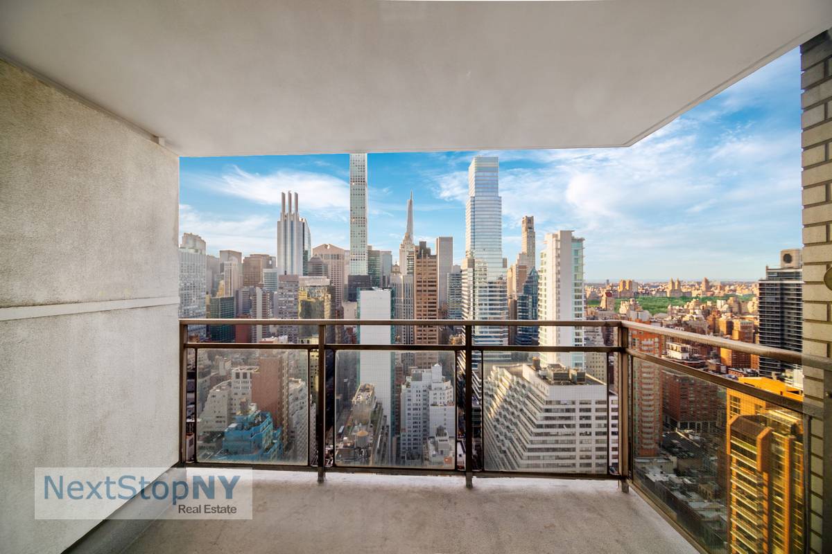 Indulge in unparalleled sophistication and luxury within this meticulously renovated New York City apartment, offering panoramic skyline and Central Park views.